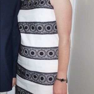 White dress with black lace stripes